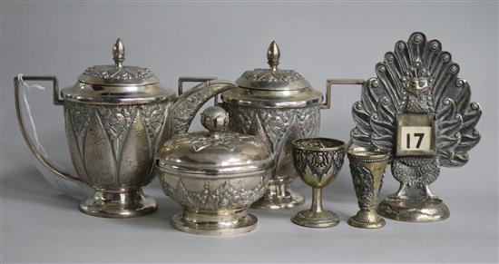 A 20th century Indonesian white metal hot milk jug and lidded sugar bowl and three other items.
